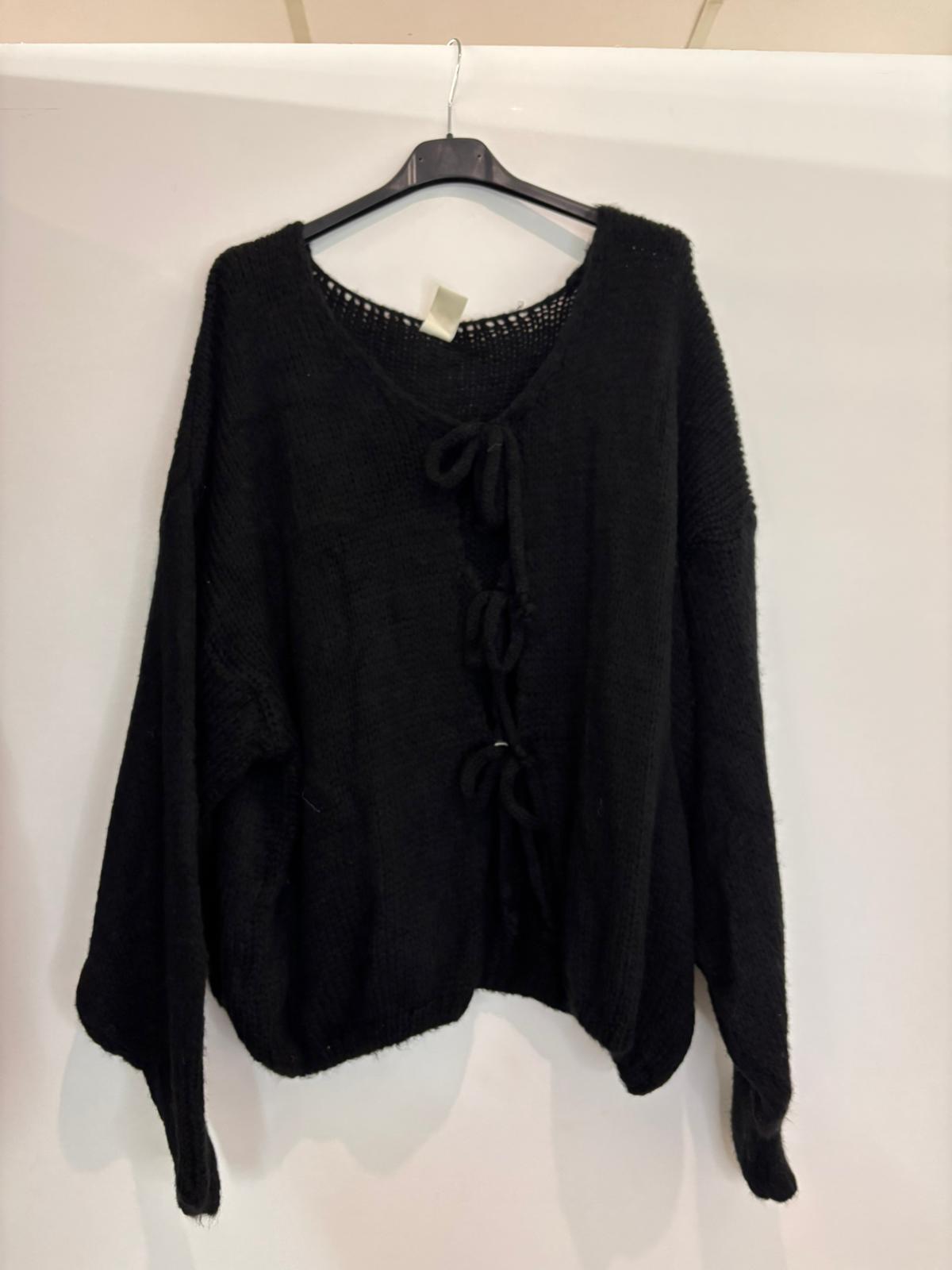 Pull oversize à nœuds sur le devant