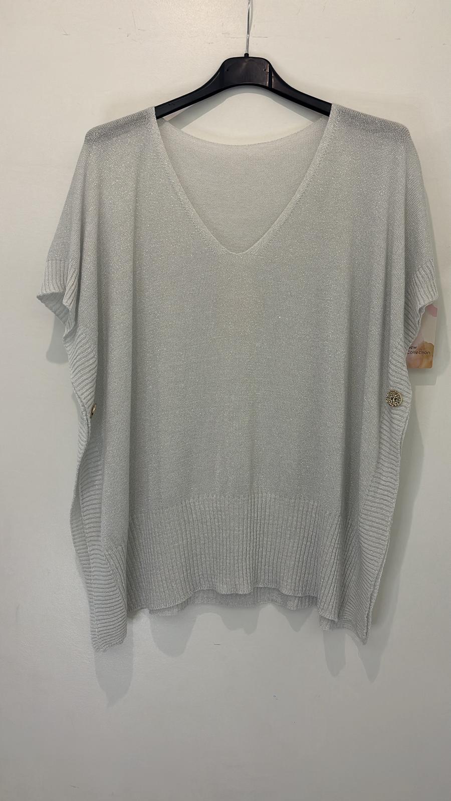 Poncho pull pailleté à boutons latéraux