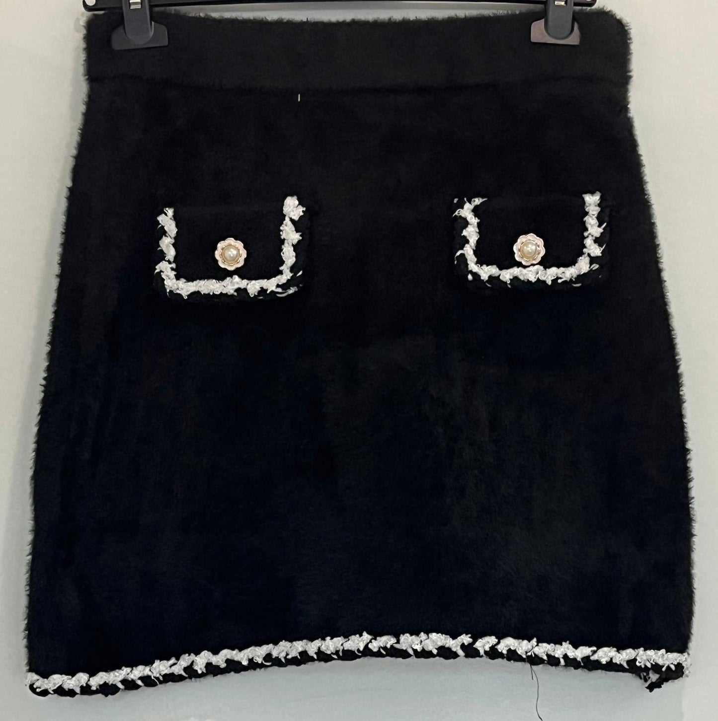 Jupe à poches bijoux et boutons dorés