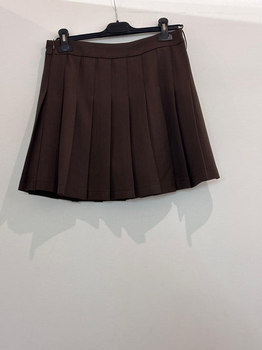 Jupe avec short intégré à plis style tennis avec taille haute et fermeture éclair