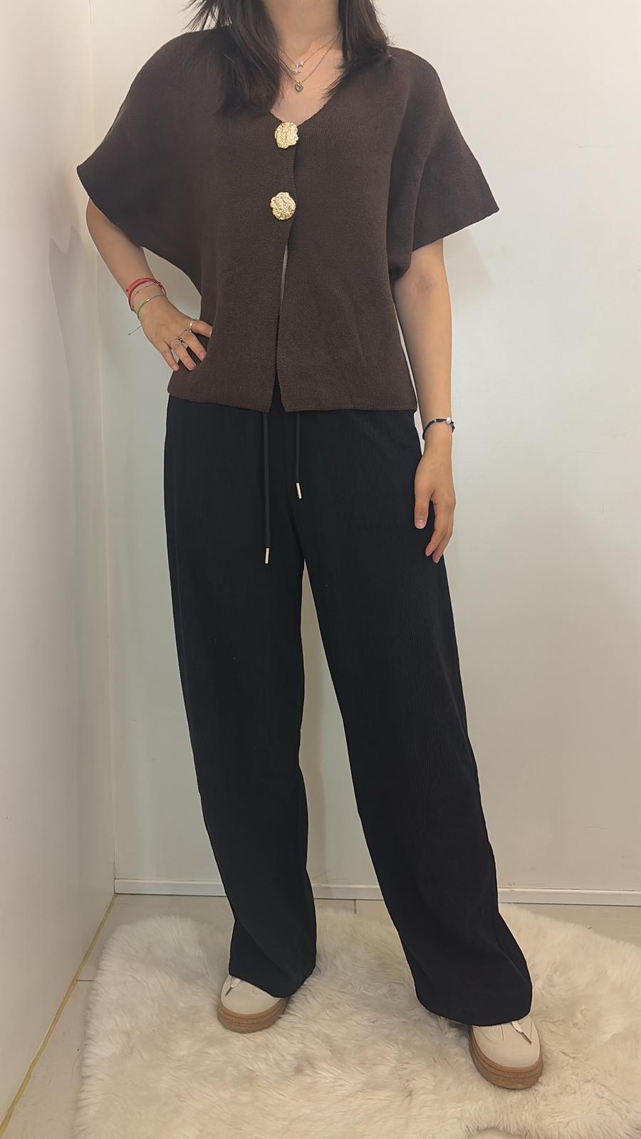 Gilet sans manches à boutons dorés