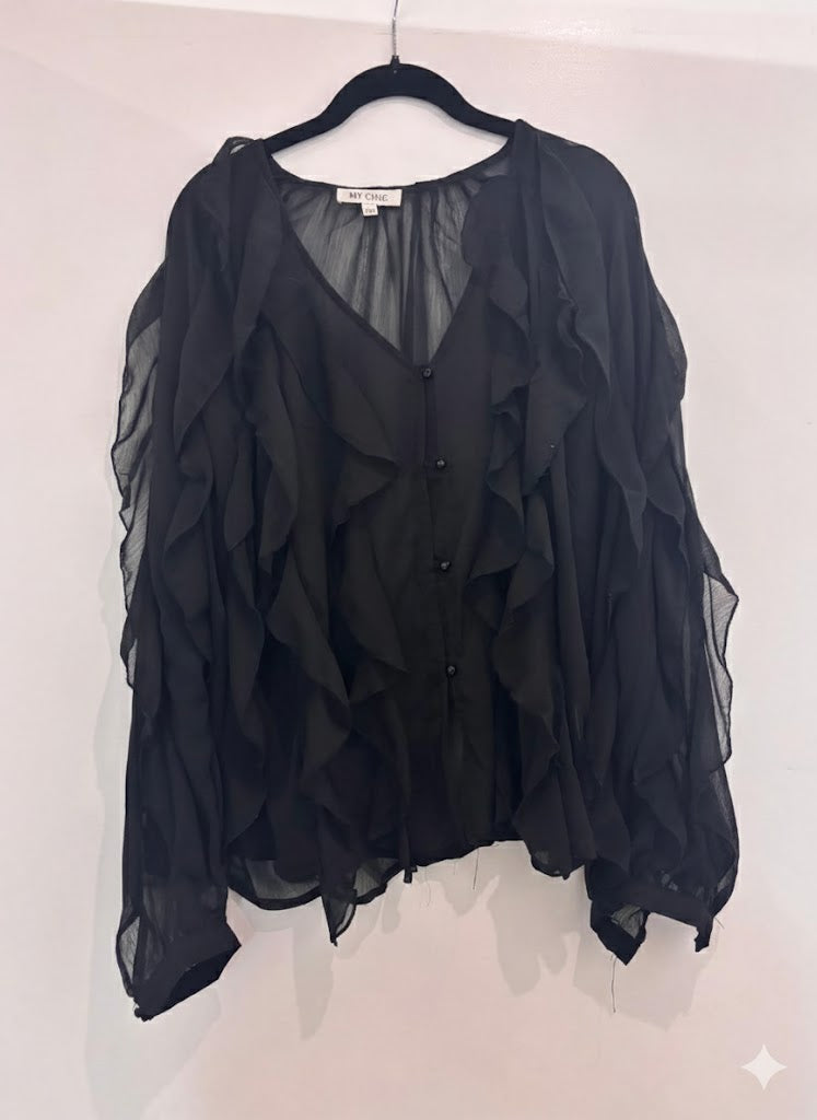 Chemise transparente à volants et col V