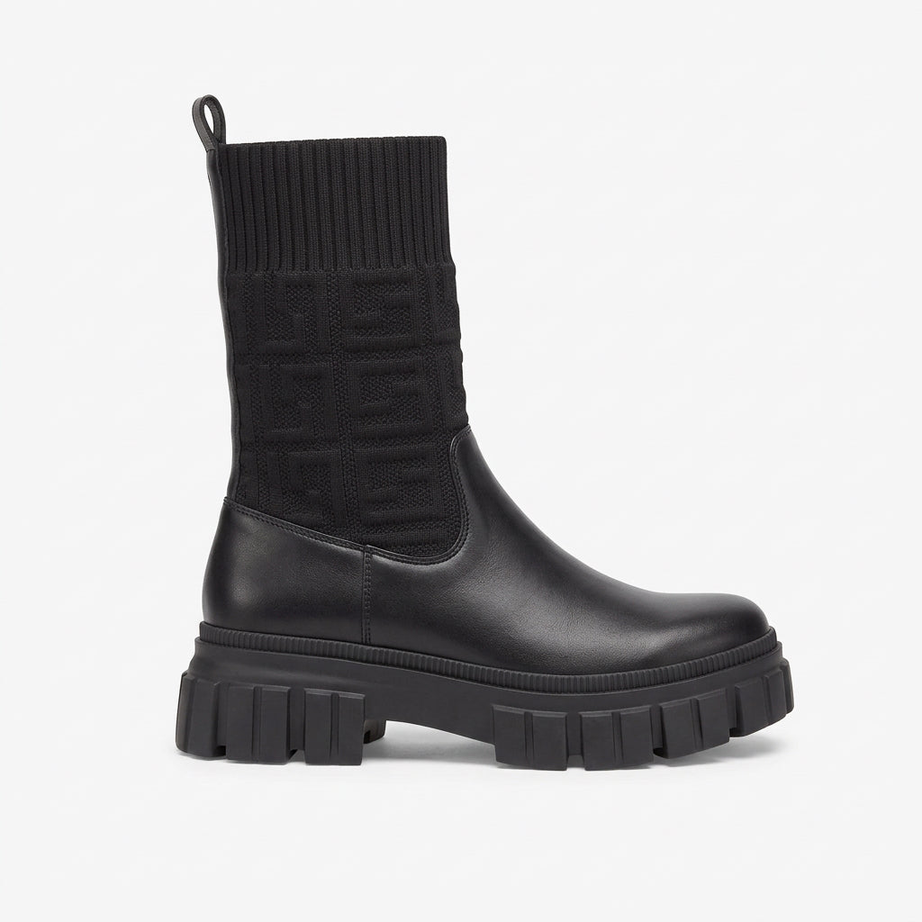 Bottines noir à tige textile et semelle épaisse crantée