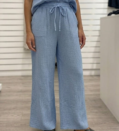 Pantalon en tissu gaze de coton texturé avec taille élastiquée et cordon