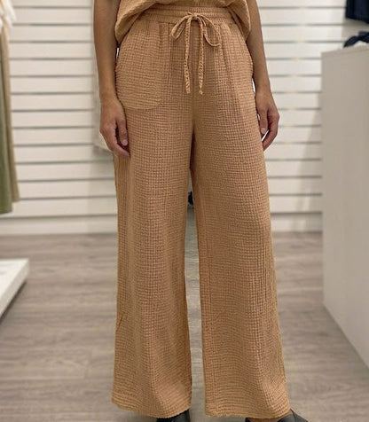 Pantalon en tissu gaze de coton texturé avec taille élastiquée et cordon