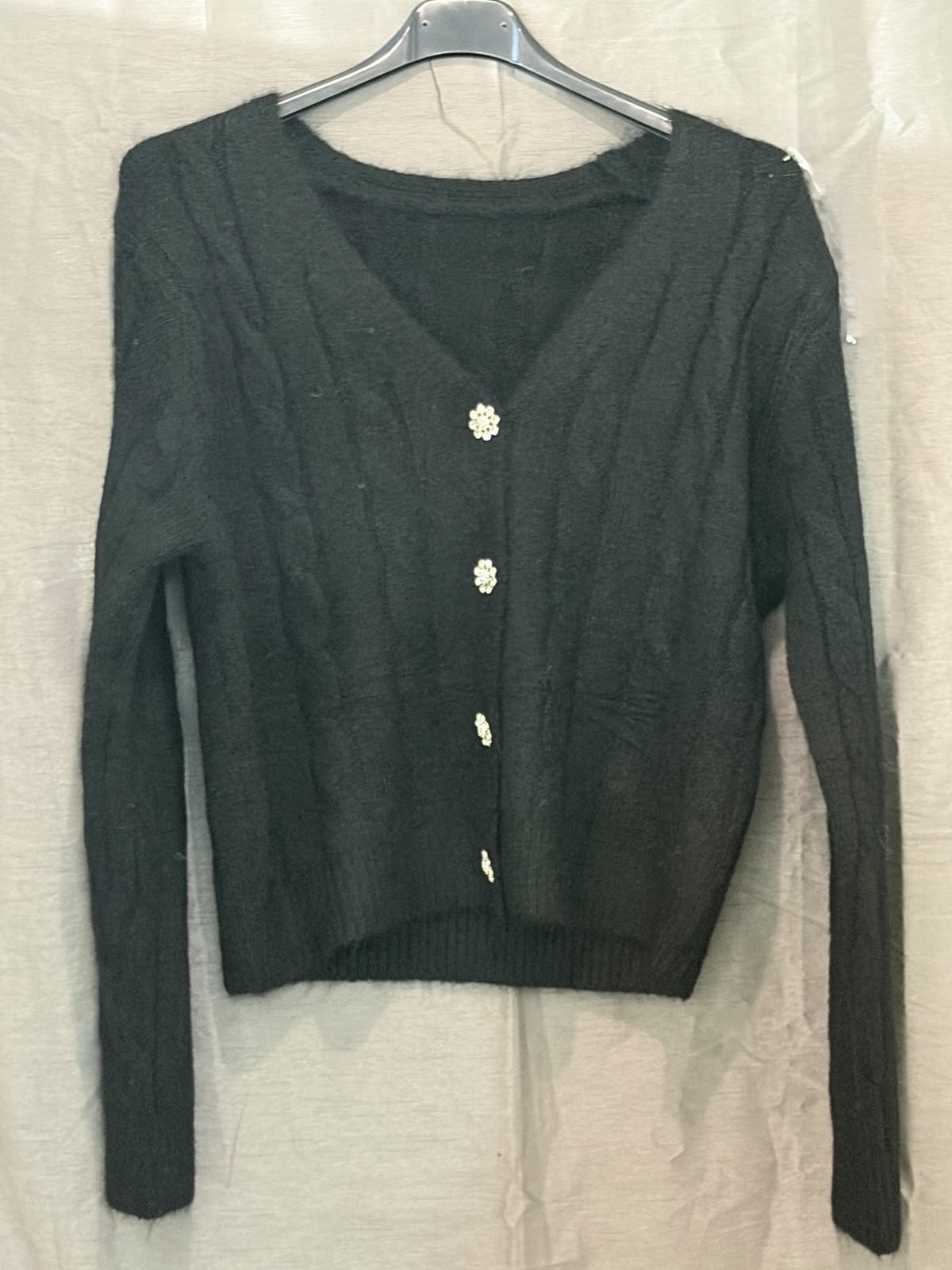 Cardigan en maille duveteuse à boutons fleuris