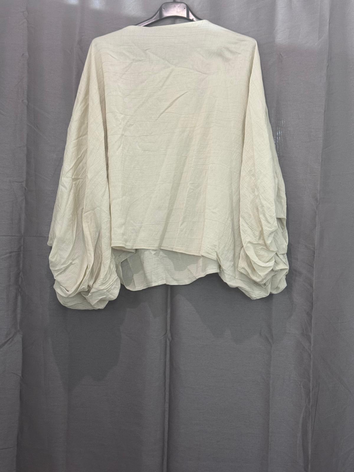 Haut oversize à manches bouffantes