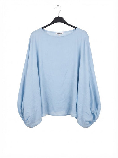 Haut oversize à manches bouffantes