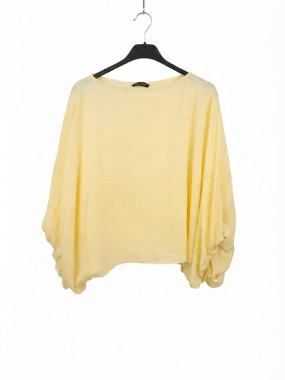 Haut oversize à manches bouffantes