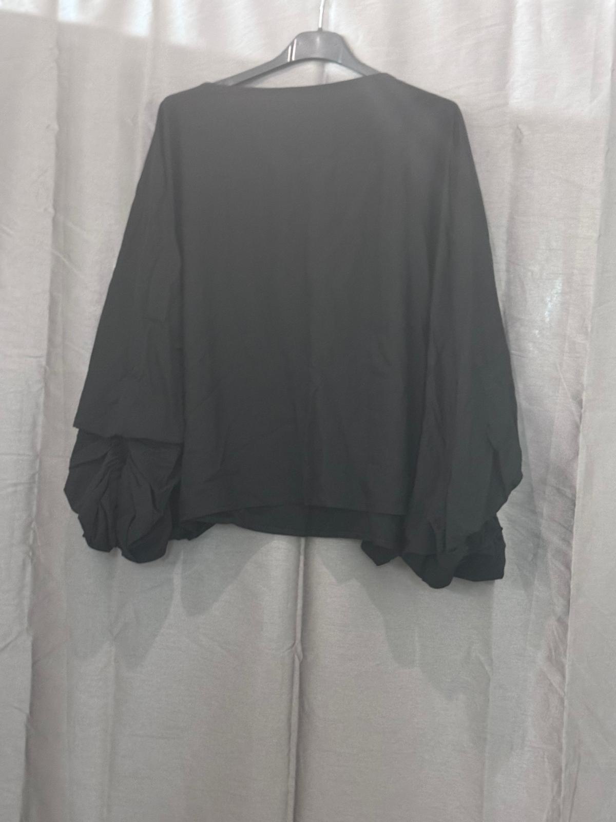 Haut oversize à manches bouffantes