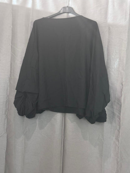Haut oversize à manches bouffantes
