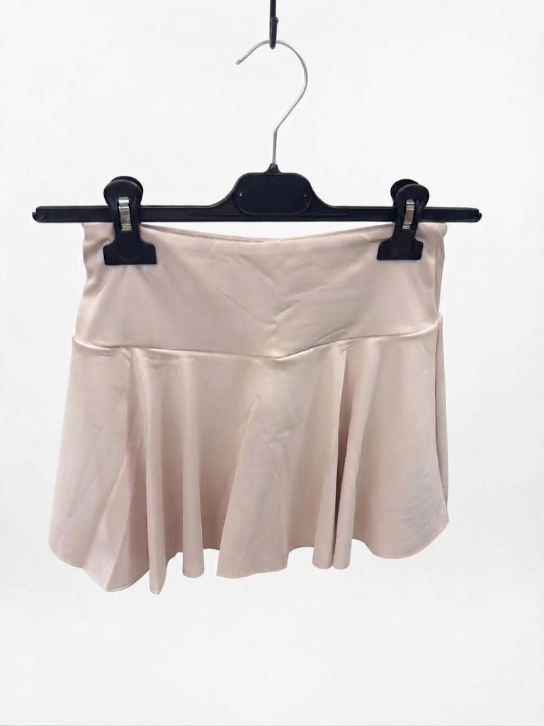 Mini-jupe avec short et poche à larges plis plats