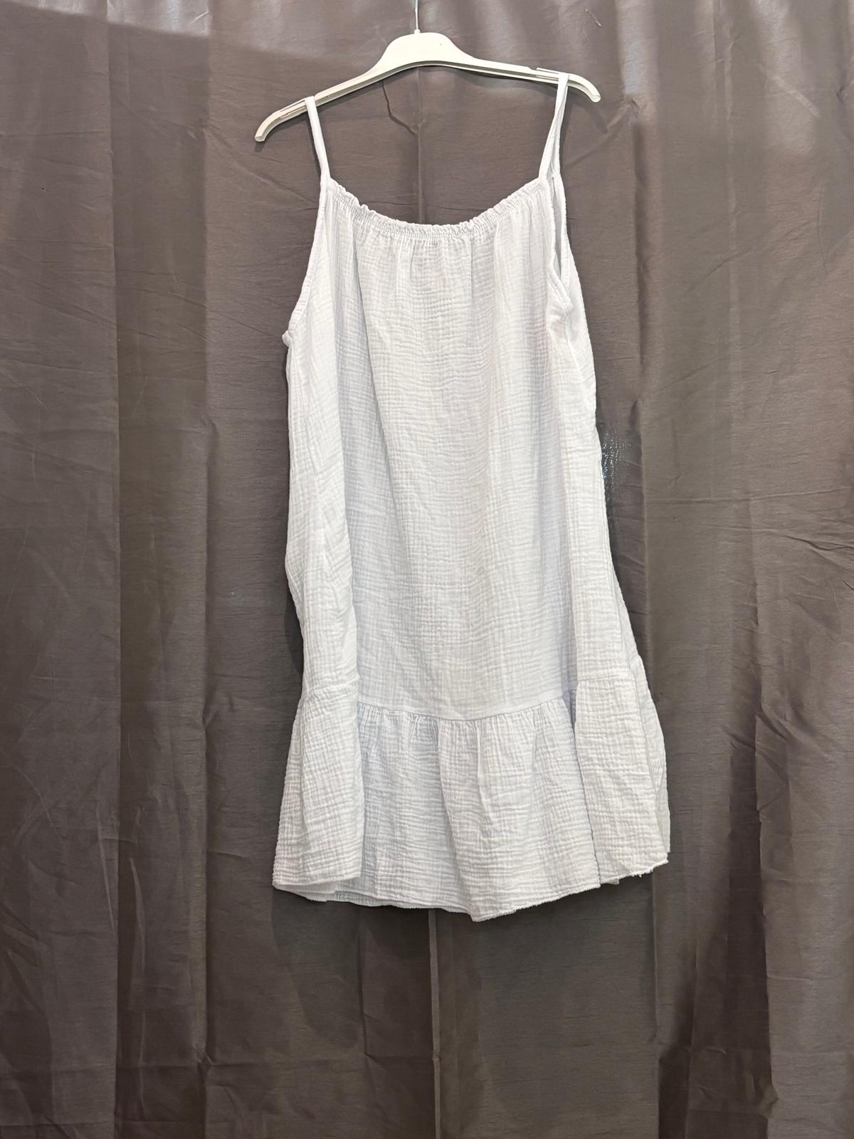 Robe courte en gaze de coton, bretelles fines et volant bas