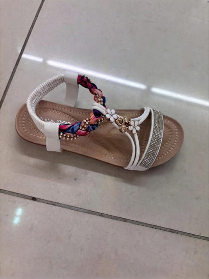 Sandale à strass et lien fleuri