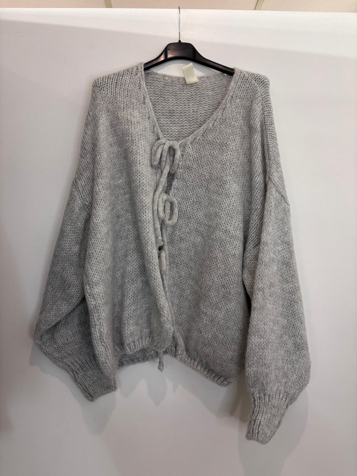 Pull oversize à nœuds sur le devant