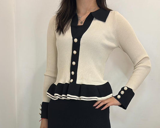 Pull bicolore à boutons bijoux