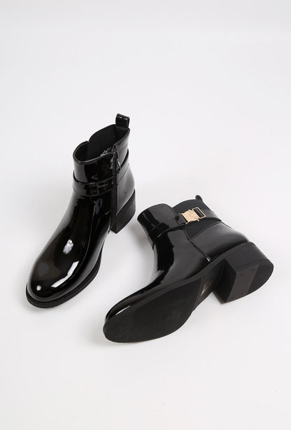 Bottines à boucle dorée et talon bas
