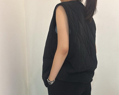 Gilet sans manches matelassé à poches