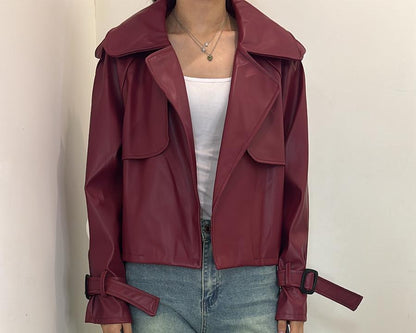 Veste en simili cuir avec ceinture