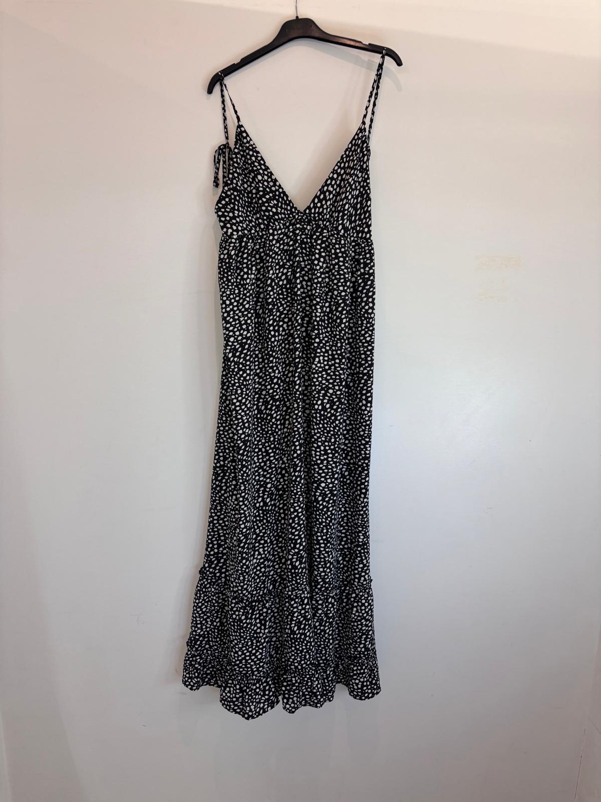 Robe longue à pois blancs