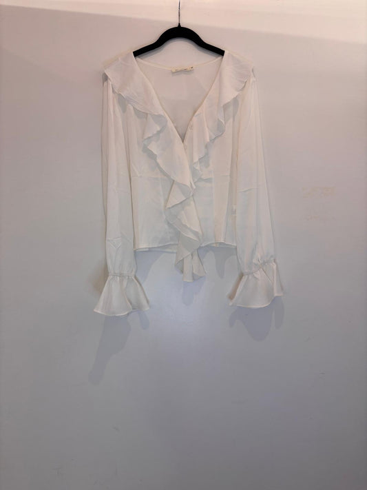 Blouse élégante à volants et manches évasées