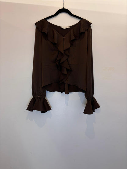 Blouse élégante à volants et manches évasées