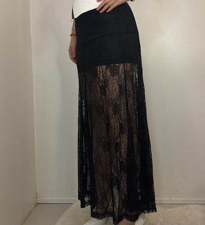 Jupe longue transparente en dentelle doublée