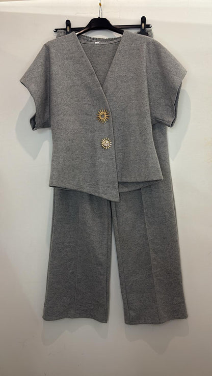 Ensemble à boutons dorés effet soleil