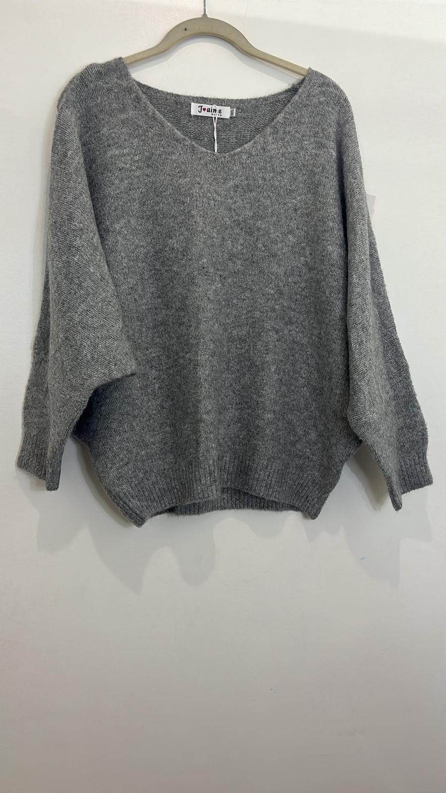 Pull asymétrique épaules dénudées