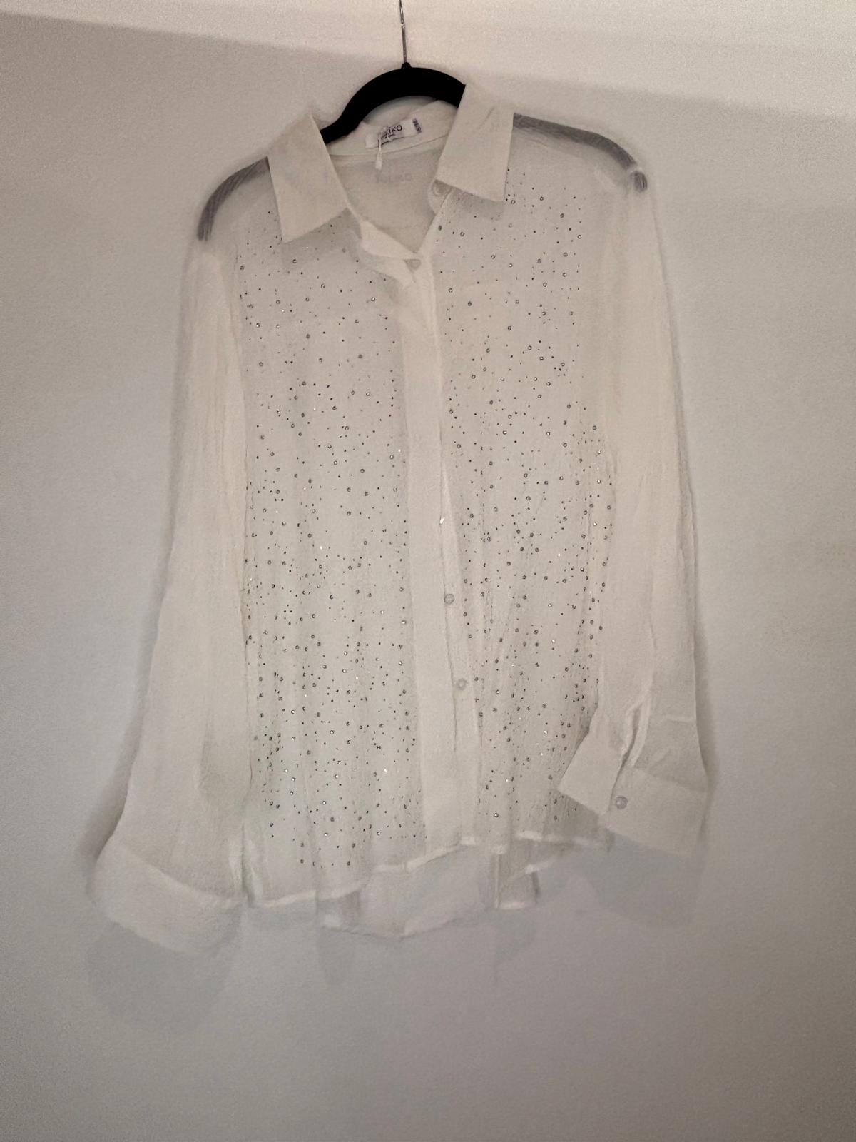 Chemise transparente à strass