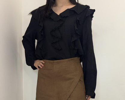 Chemise à volants élégante