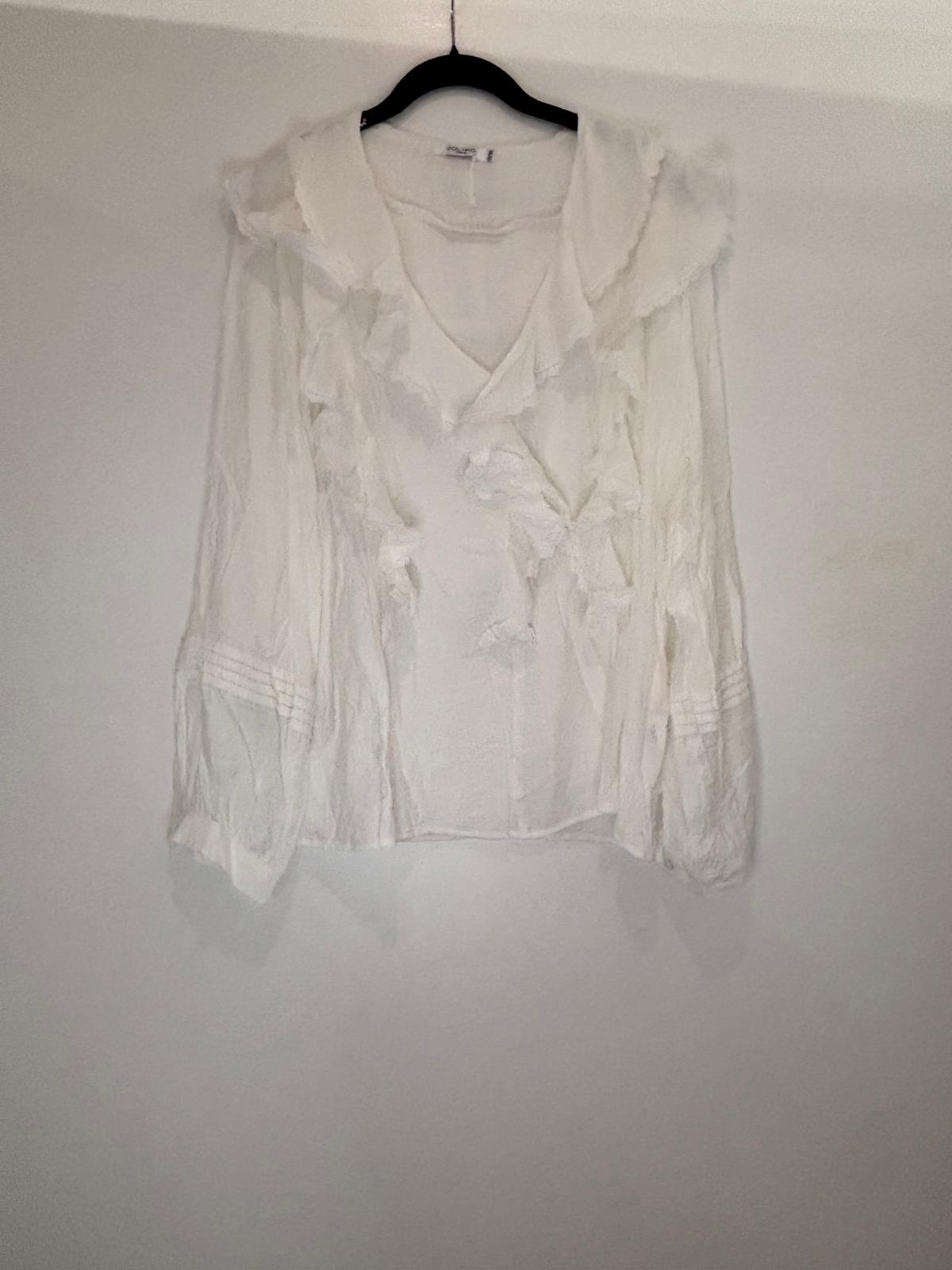 Chemise à volants élégante