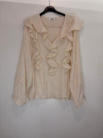 Chemise à volants élégante