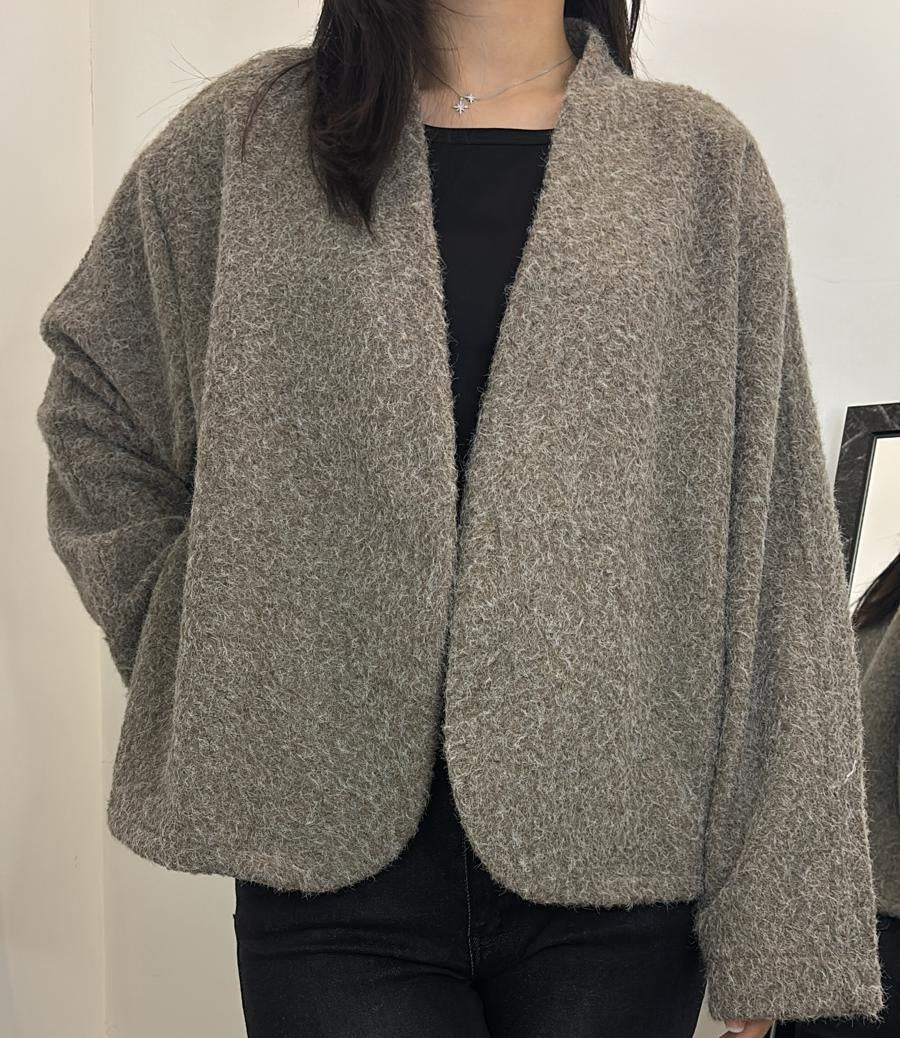 Gilet court en maille duveteuse