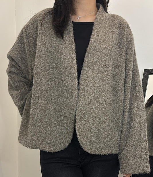 Gilet court en maille duveteuse