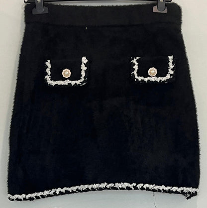 Jupe à poches bijoux et boutons dorés