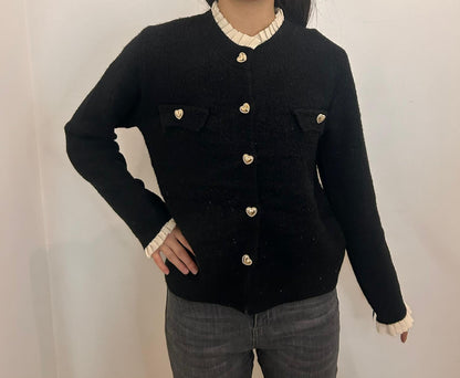 Gilet à boutons cœur dorés