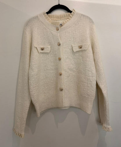 Gilet à boutons cœur dorés