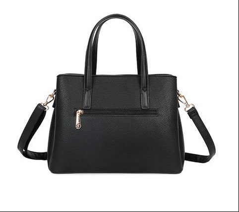 Sac noir à doubles anses avec finitions dorées