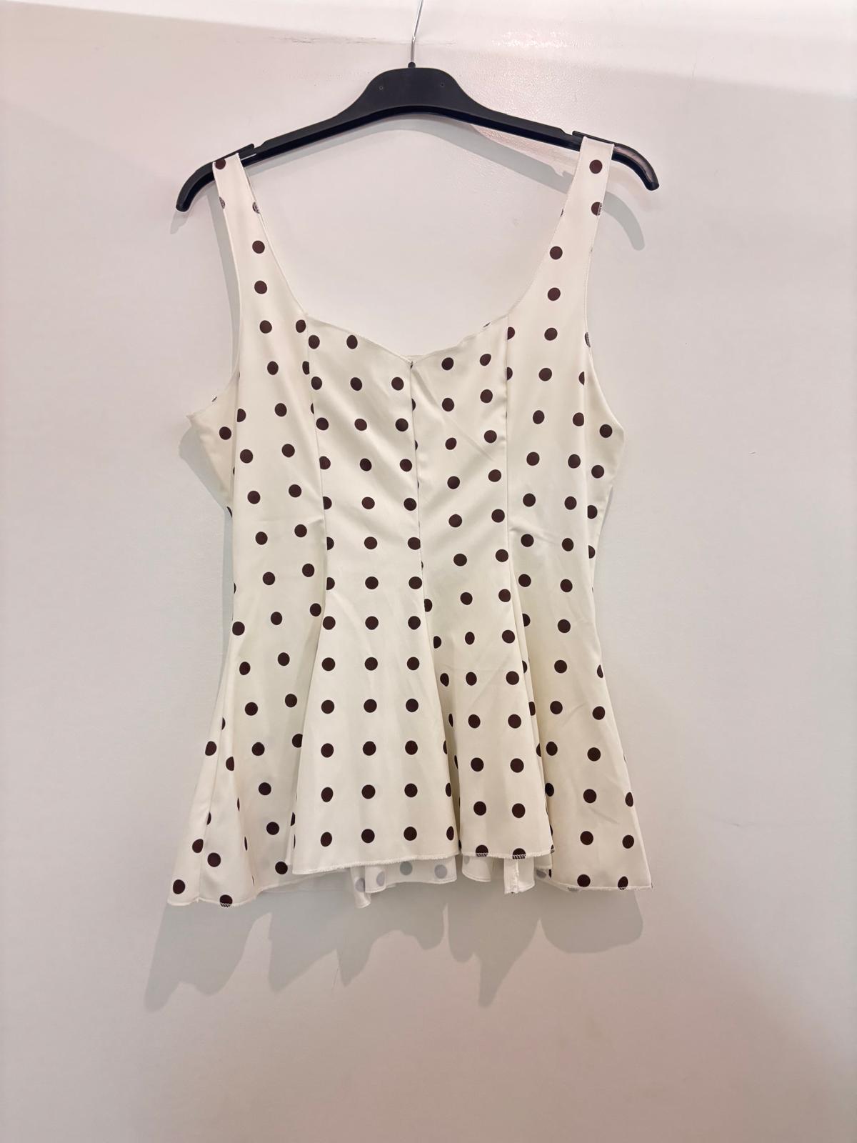 Top à bretelles à pois avec décolleté cœur et bas évasé peplum