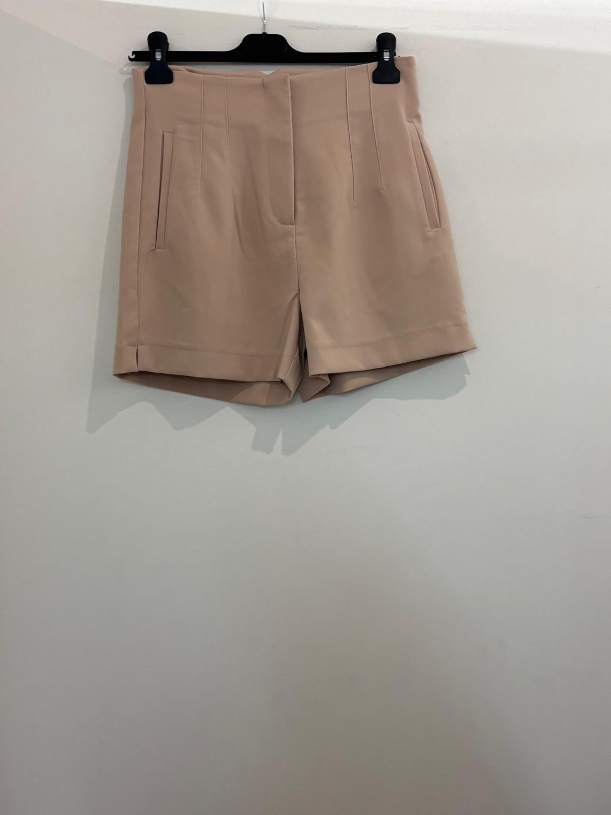 Short à taille haute avec plis et poches italiennes