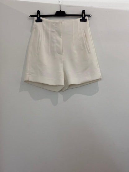 Short à taille haute avec plis et poches italiennes