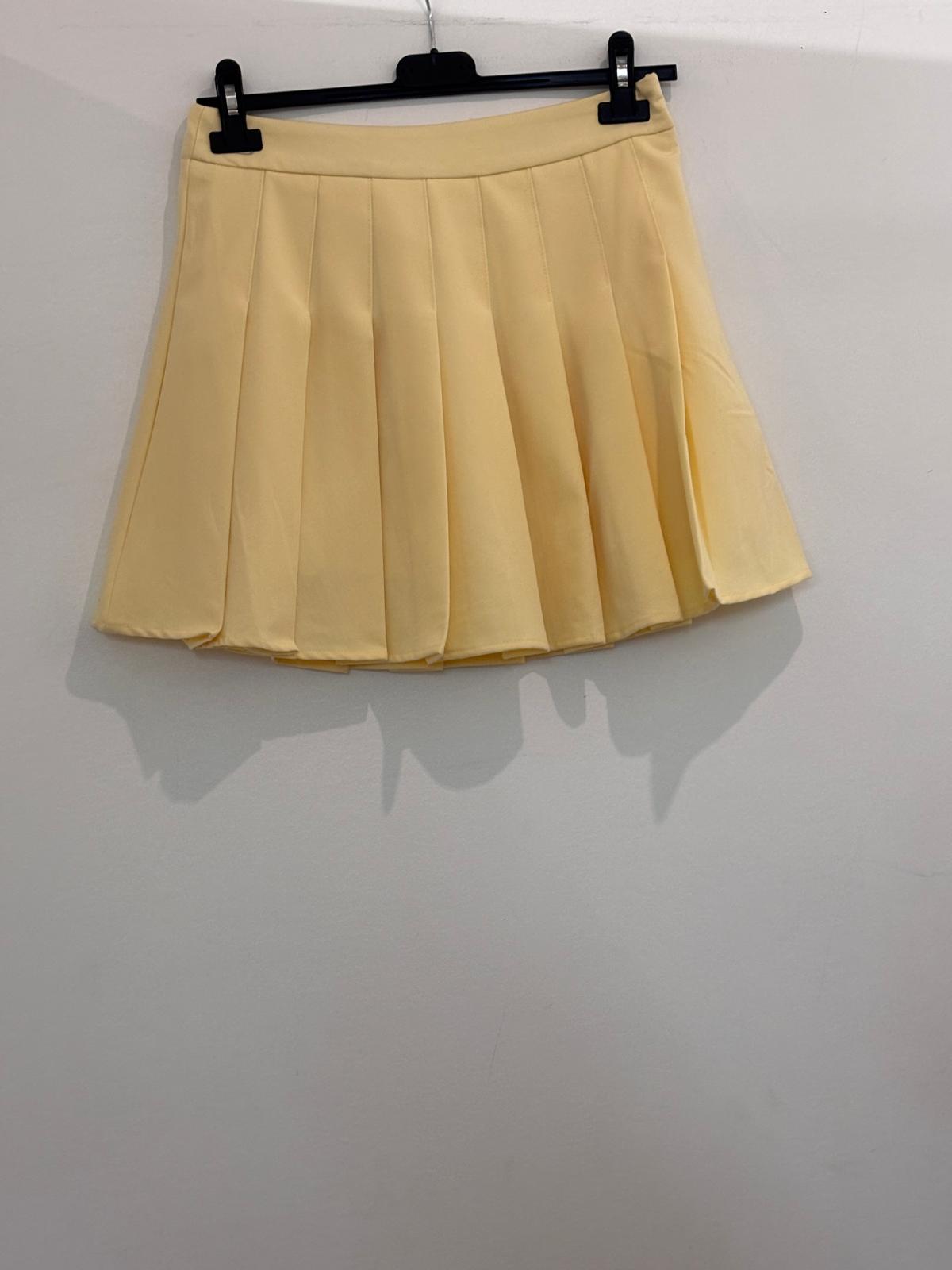 Jupe avec short intégré à plis style tennis avec taille haute et fermeture éclair