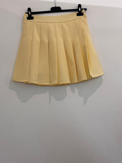 Jupe avec short intégré à plis style tennis avec taille haute et fermeture éclair