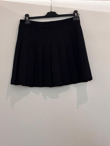 Jupe avec short intégré à plis style tennis avec taille haute et fermeture éclair