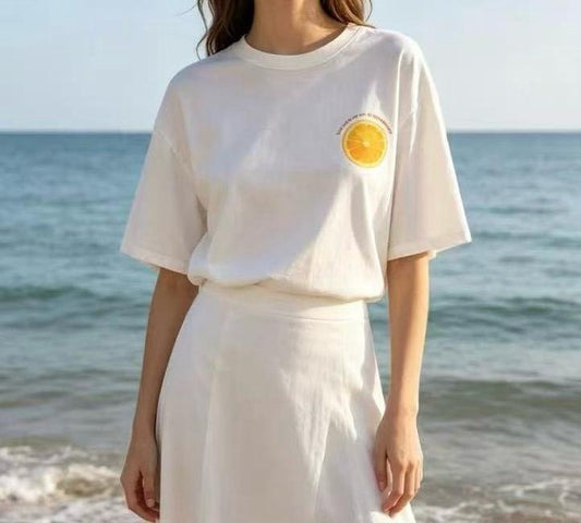 T-shirt oversize blanc col rond avec patch poitrine motif