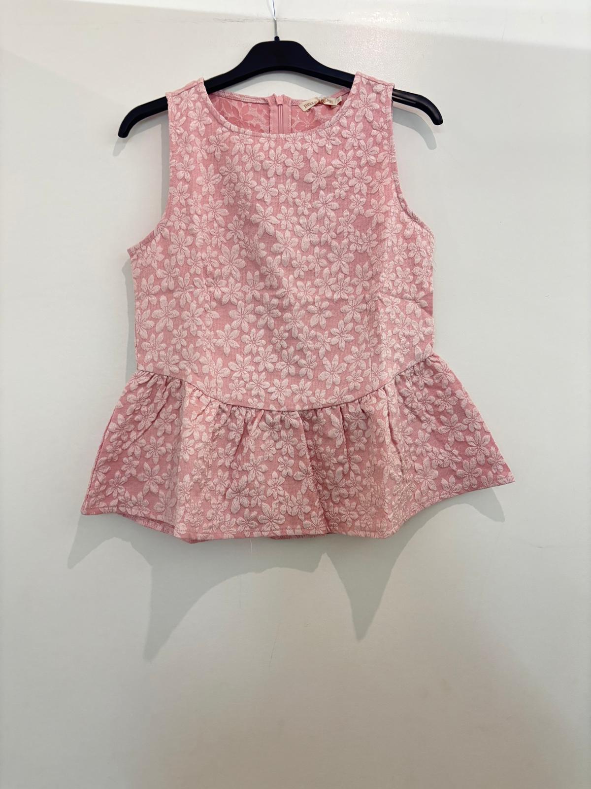 Top peplum sans manches en broderie anglaise florale col rond et fermeture dos