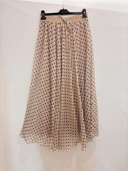 Jupe longue fluide à pois en mousseline semi-transparente taille élastiquée