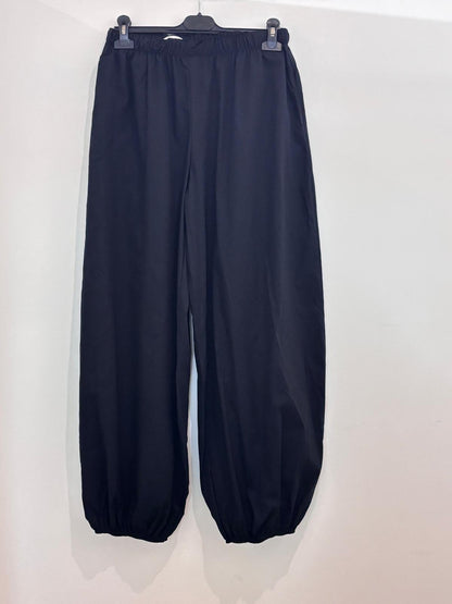 Pantalon large taille élastiquée style bouffant resserré aux chevilles