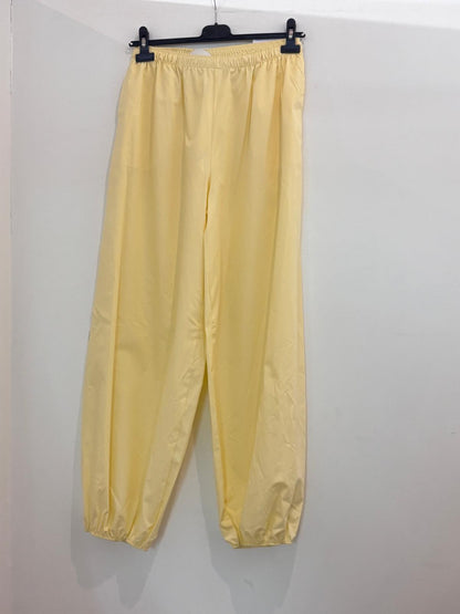 Pantalon large taille élastiquée style bouffant resserré aux chevilles